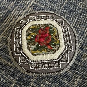 Embroidered Floral Anthropologie clutch with optional chain strap